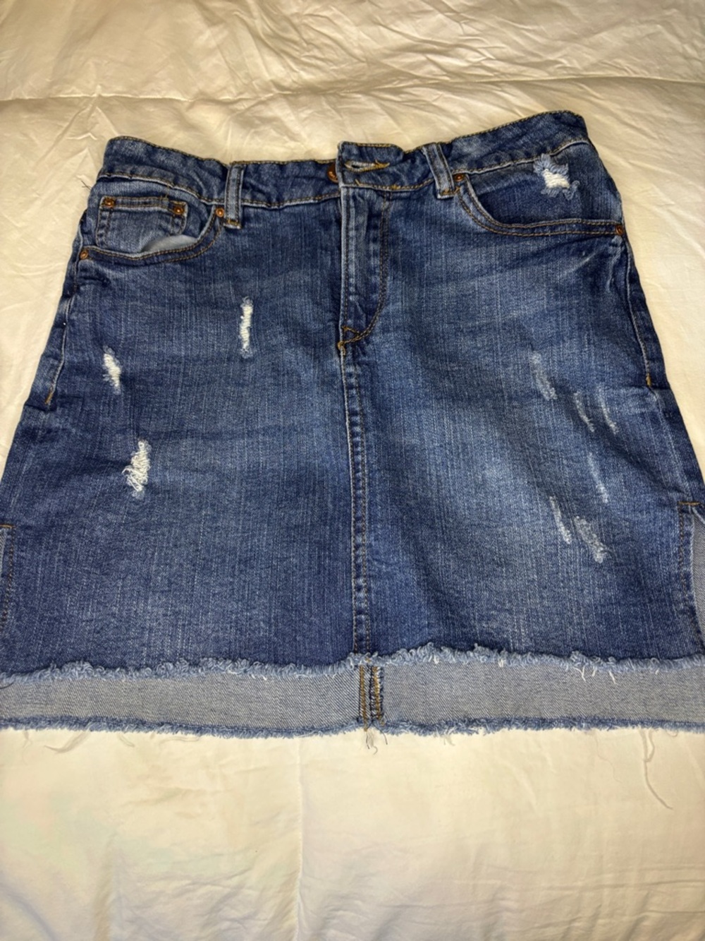 Almost Famous Denim Mini Skirt in Blue - Casual Distressed Style with Ragged Hem